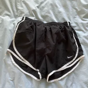 Black &amp; white Nike running shorts