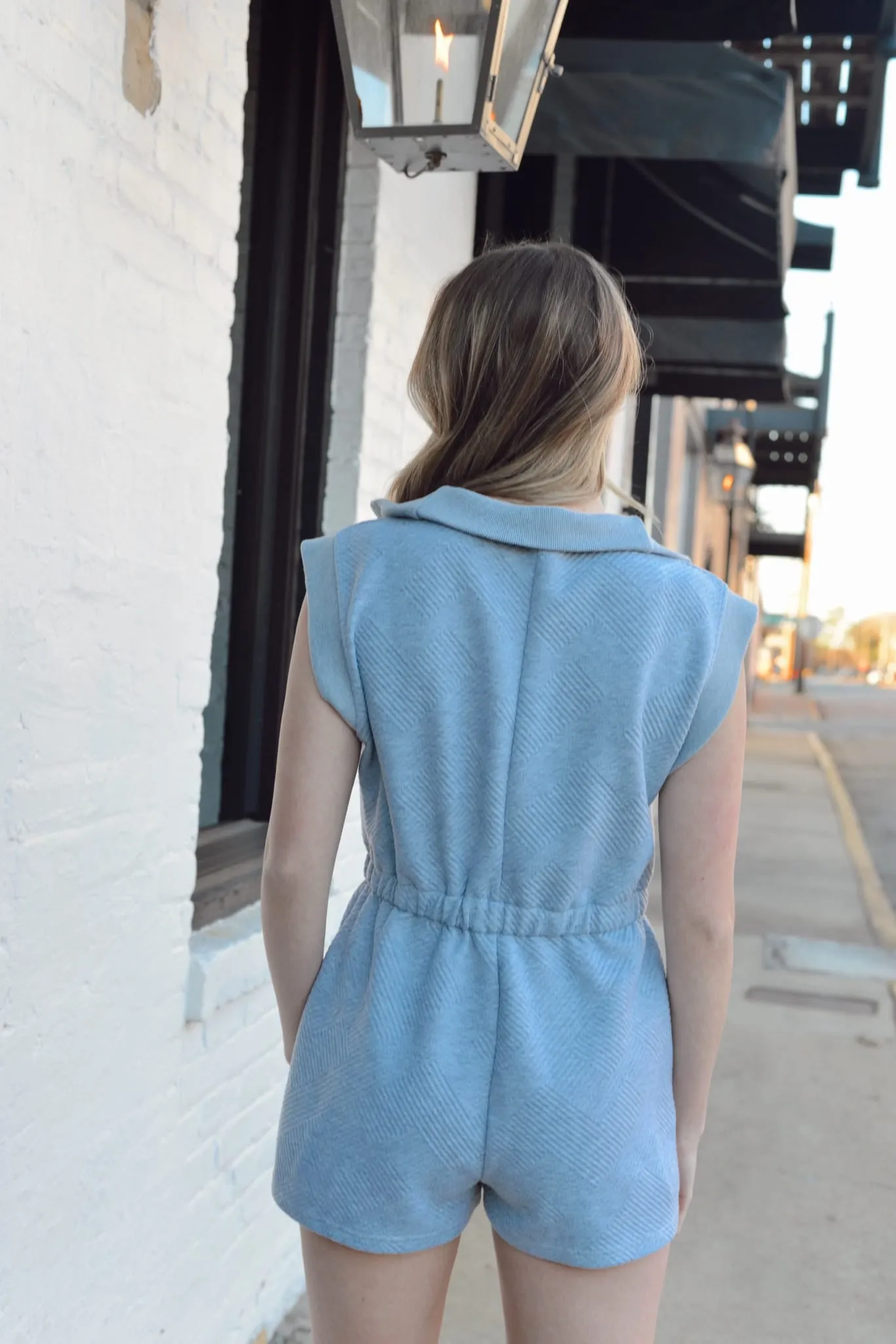 DROP SHOULDER TEXTURED FRONT ZIP ROMPER WITH SIDE POCKETS
