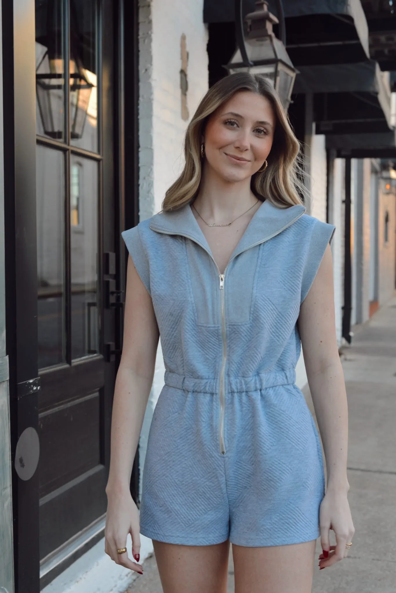 DROP SHOULDER TEXTURED FRONT ZIP ROMPER WITH SIDE POCKETS