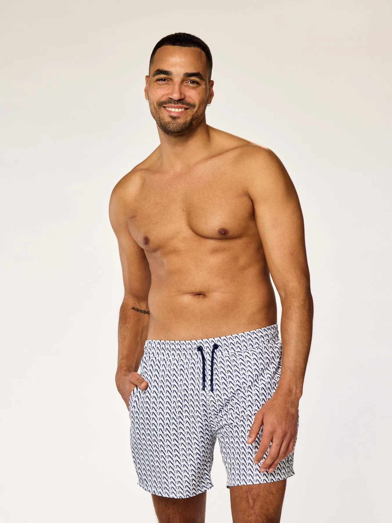 EOS - Swim Shorts • Dark Blue Monogram