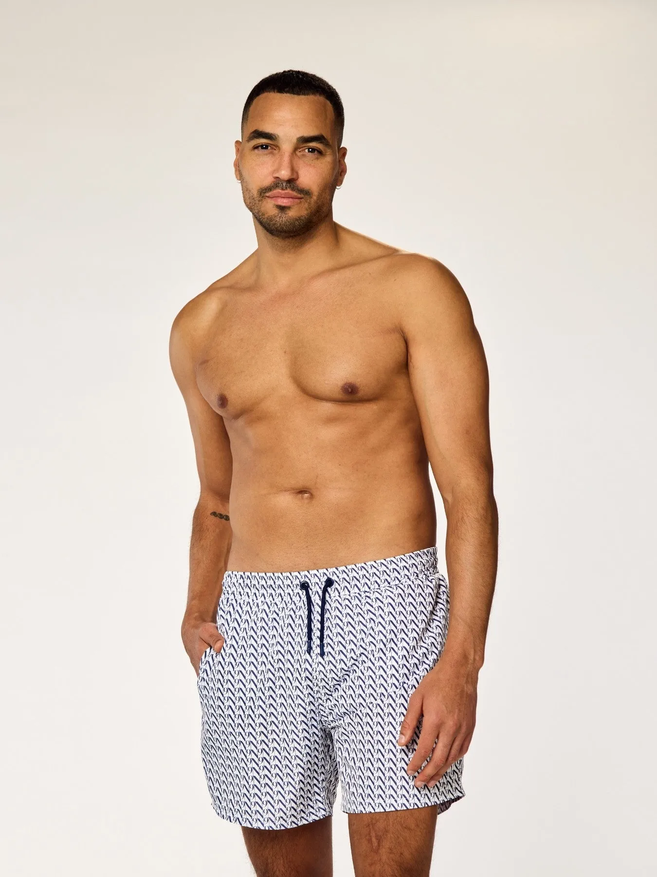 EOS - Swim Shorts • Dark Blue Monogram