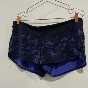 Lululemon blue /purple camo pattern running shorts. Size 10