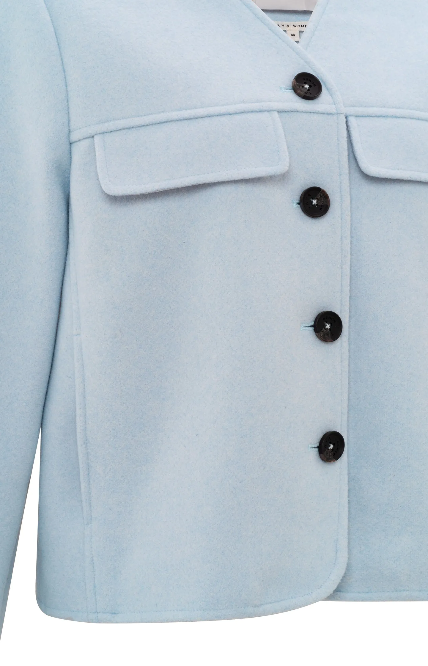 Soft short jacket with chest pockets and button closure